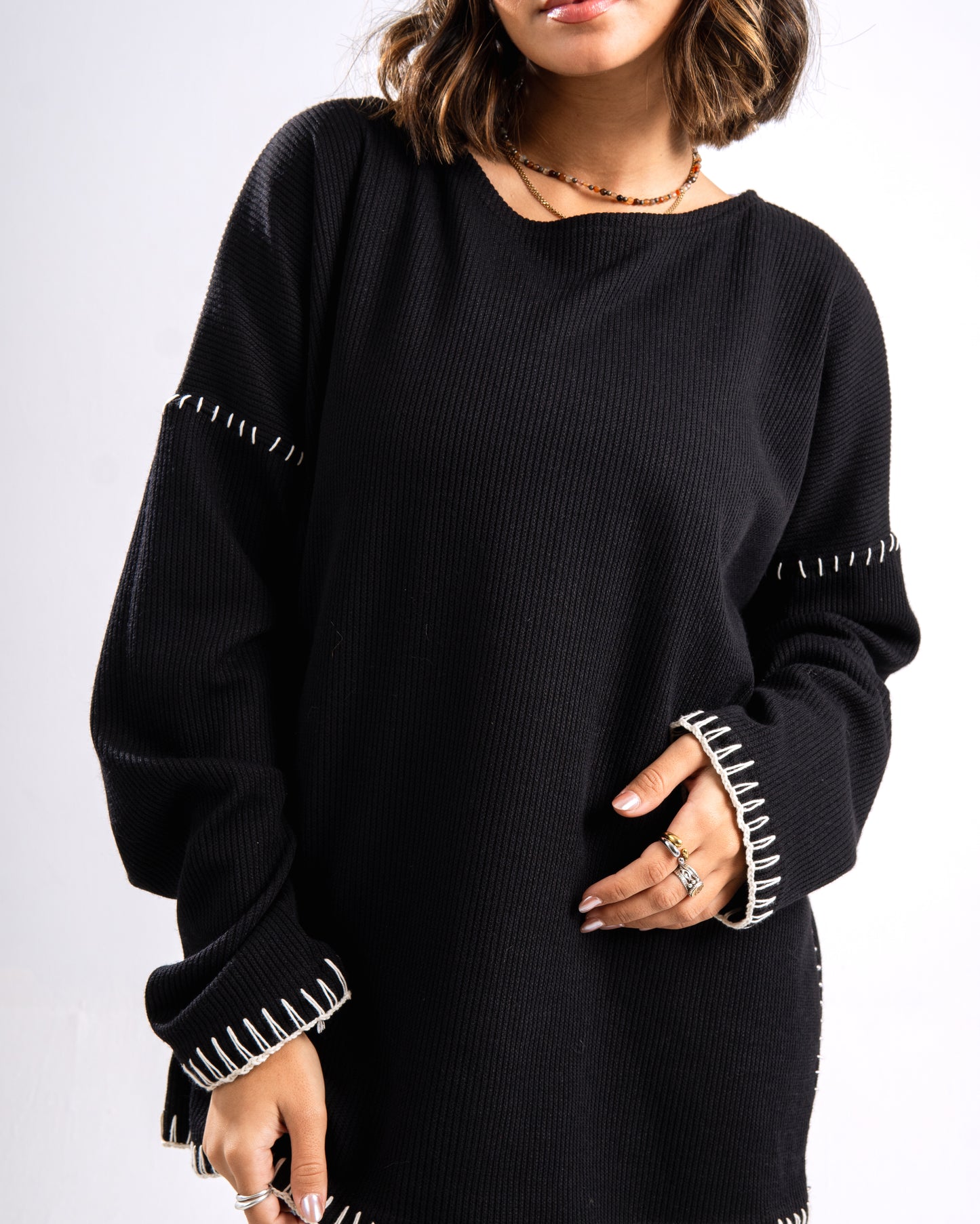 Black stitched ribbed sweater